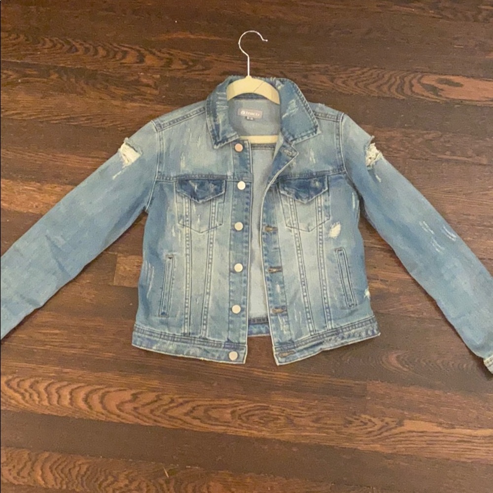 This is a ripped jean jacket